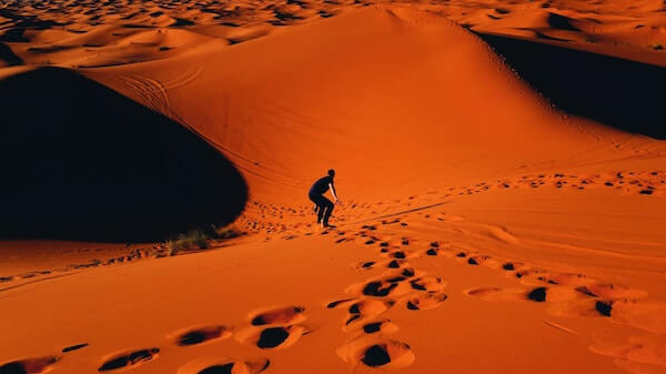Sand boarding in the Sahara desert
